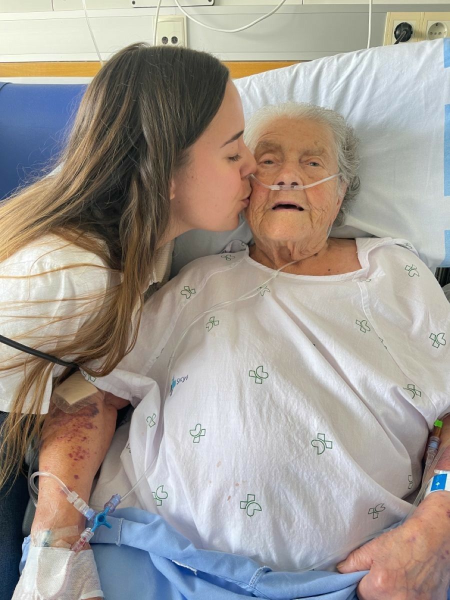 Margaret Thompson receiving care from a family member